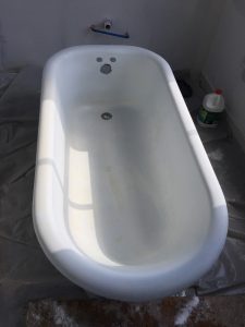 100 year old cast iron clawfoor tub